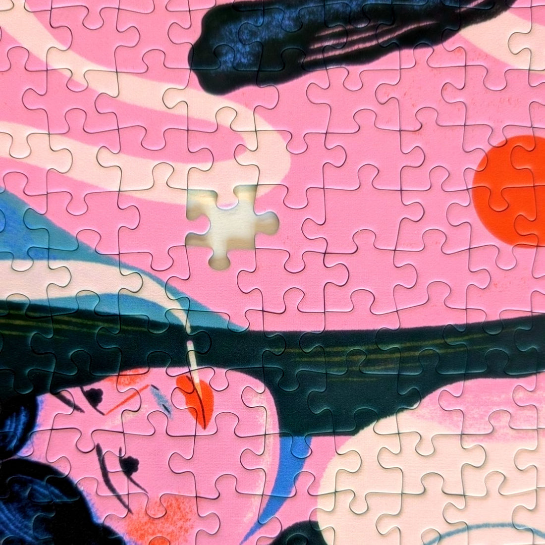BURNING by Clara Super Duper – close-up of the assembled jigsaw puzzle with one missing piece