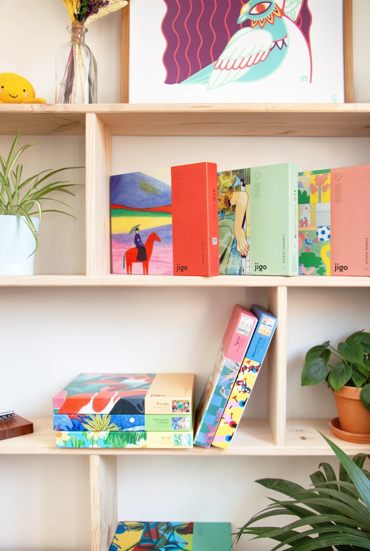 jigo atelier puzzle boxes on a wooden shelf: CHEVAL ROUGE by Anne Laval, Núria Tamarit, Aysha Tengiz